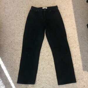 Great, soft wash black button up fly jeans from Reformation.